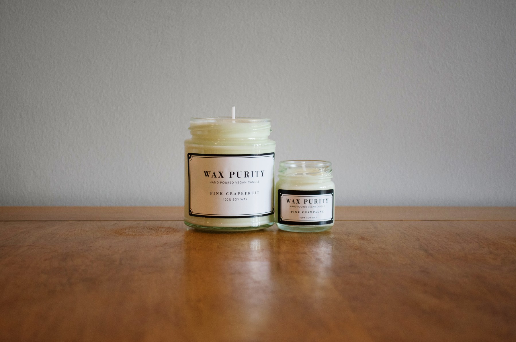 A pair of wax purity candles