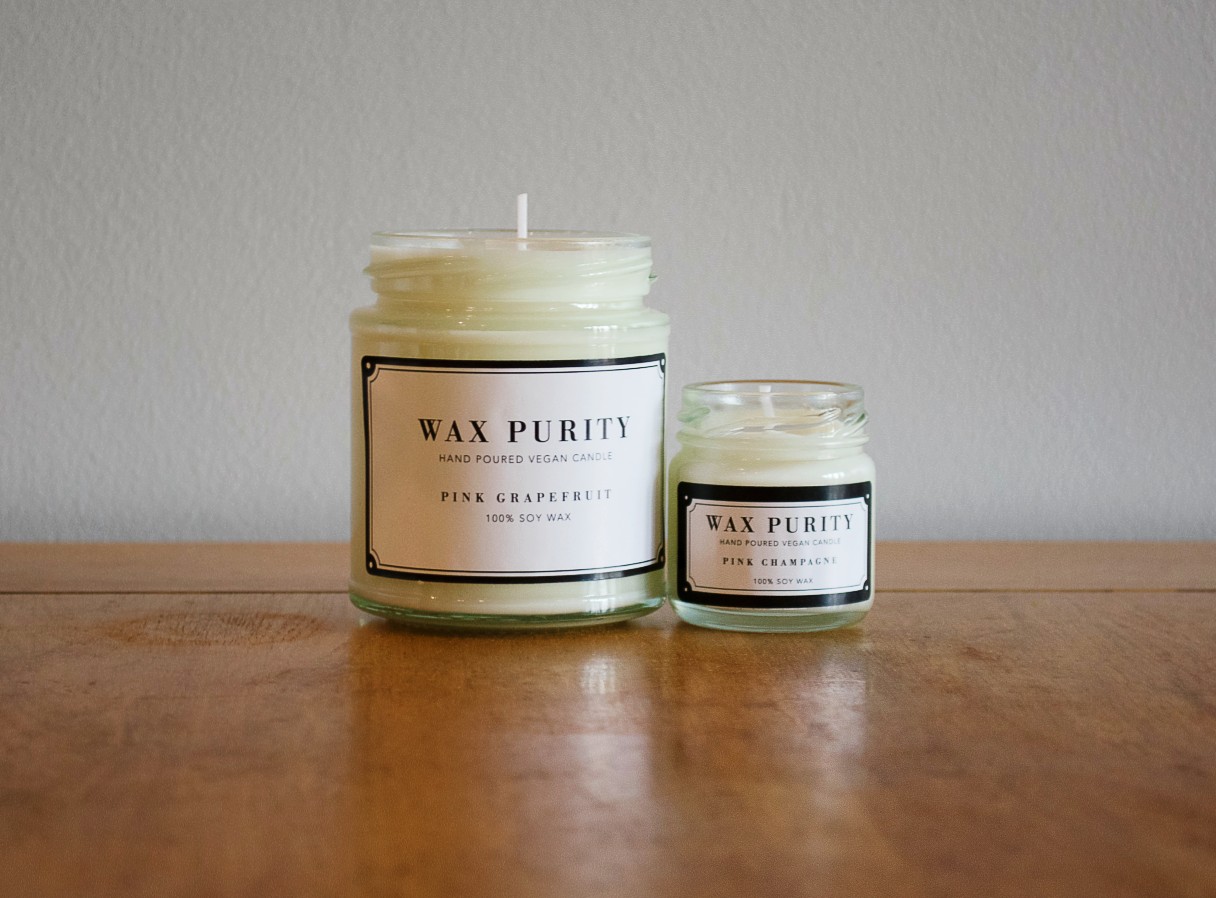 A pair of wax purity candles